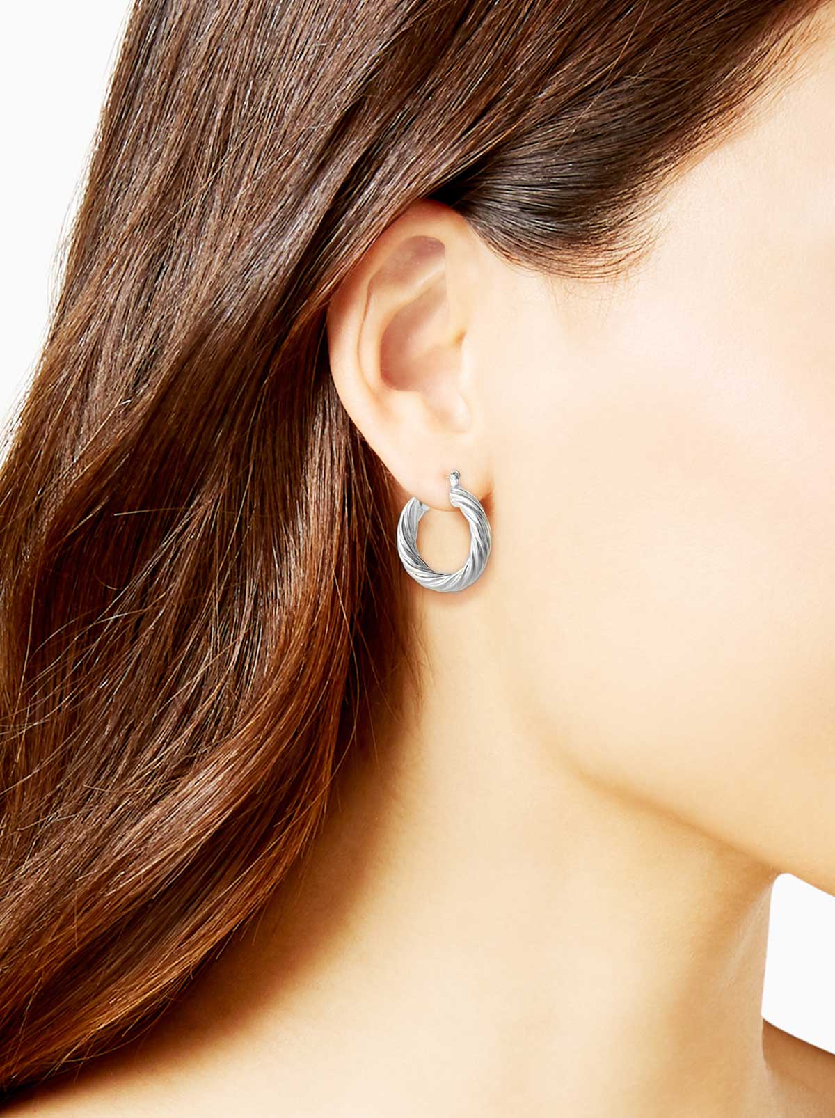 Jessica Simpson Thick Twisted Hoop Earrings in Silver