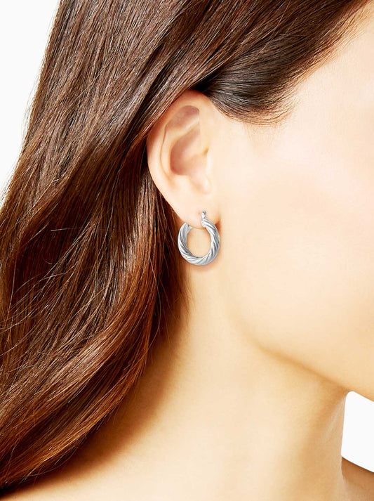 Jessica Simpson Thick Twisted Hoop Earrings in Silver